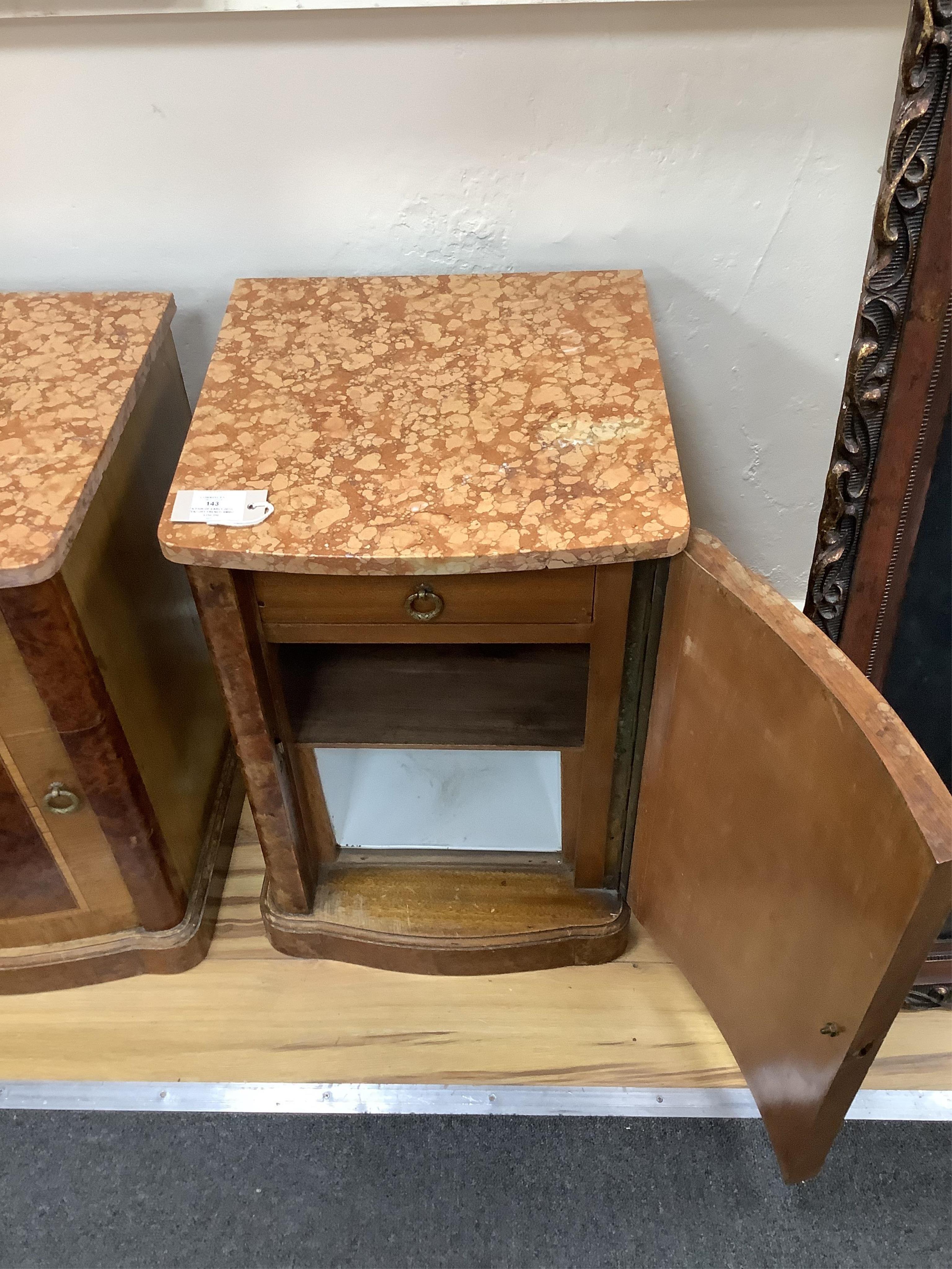 A pair of early 20th century French amboyna and mahogany marble top bedside cabinets, width 40cm, depth 43cm, height 58cm. Condition - fair